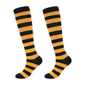 Junely Compression Socks for Women Knee High Striped Polka Dot Stockings - color: Black Orange